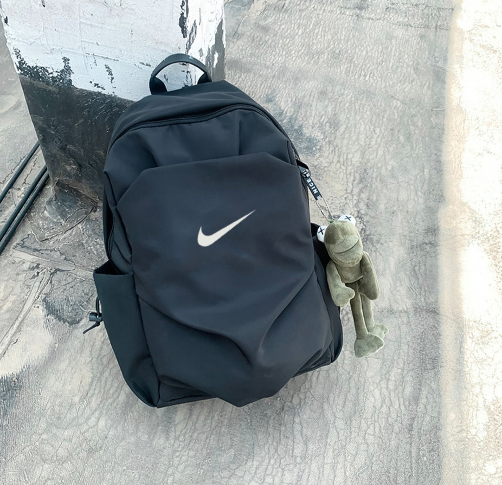 Sac à dos NIKE & chargeur de téléphone
